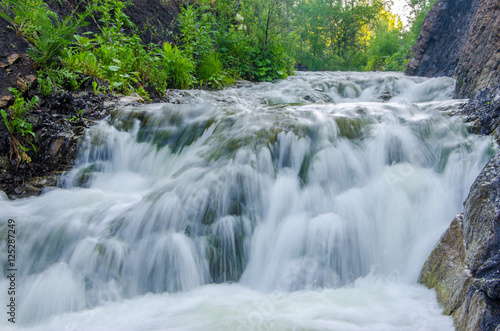 falling water in the morning mist.