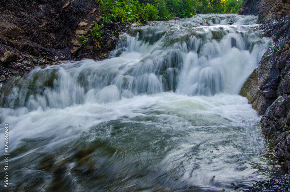 falling water in the morning mist.