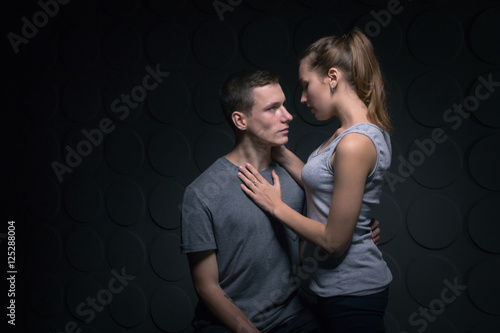 Passionate young couple in the room