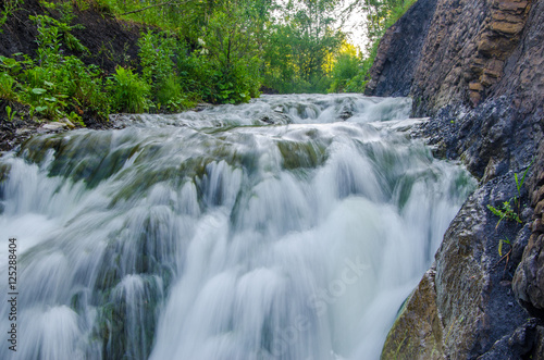 falling water in the morning mist.