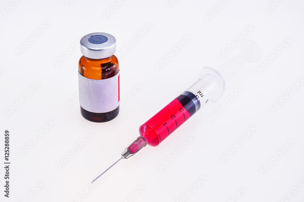 Syringe and vial (Vaccine, drugs, medication, fluid) in the hos Syringe and vial (Vaccine, drugs, medication, fluid) in the hos