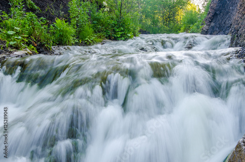 falling water in the morning mist.