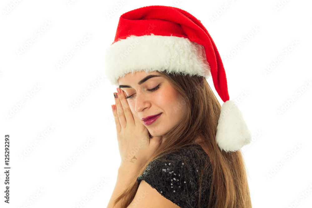 portrait of happy attractive woman in santa hat portrait of happy attractive woman in santa hat