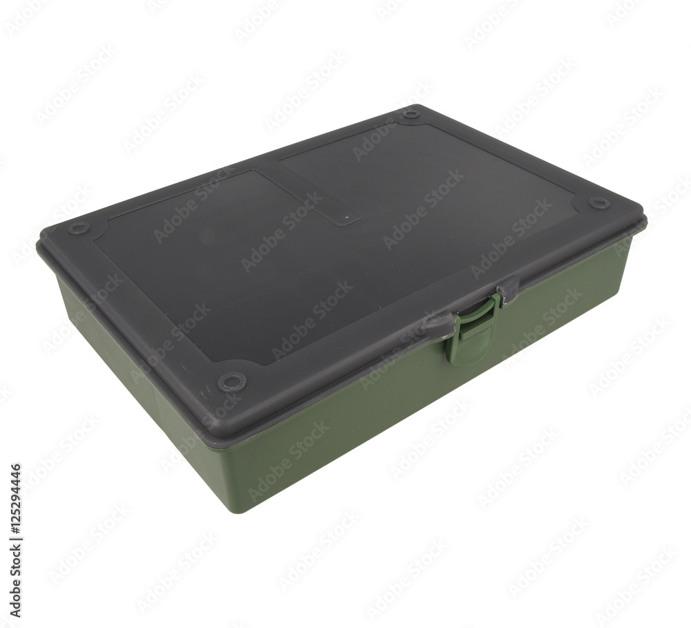 Green plastic box for fishing tackle on an isolated white Green plastic box for fishing tackle on an isolated white