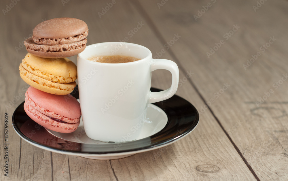 Colorful macaroons over turquoise wood backround Colorful macaroons over turquoise wood backround