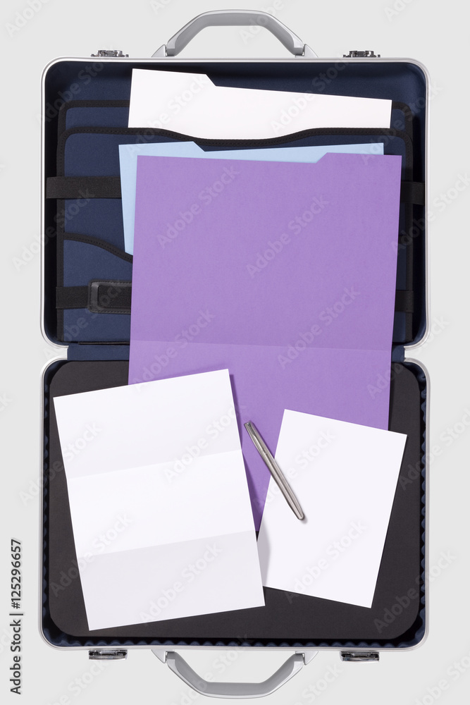 Briefcases open with Files and pen on White Background Briefcases open with Files and pen on White Background
