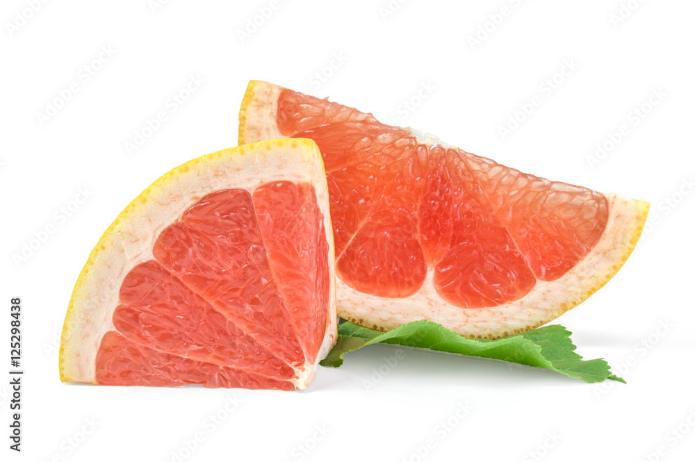 Slices of grapefruit on a white background