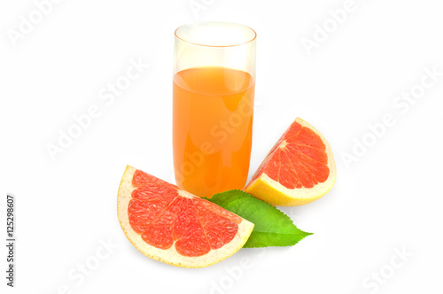 Full glass of grapefruit juice and two wedges isolated on white background