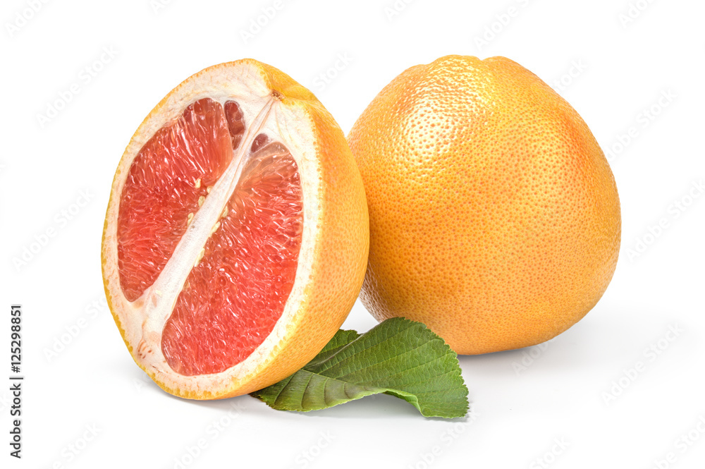 Grapefruit with half and green leaf isolated on white background Grapefruit with half and green leaf isolated on white background