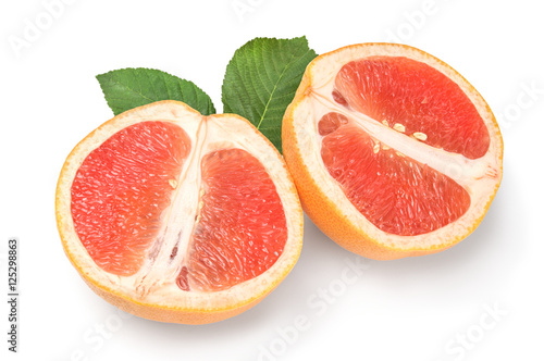 Two halves of ripe grapefruit isolated on white background