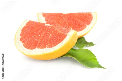 Two slices of grapefruit isolated on white background cutout