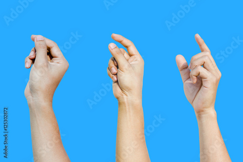  Set of many different man's hands isolated over blue background