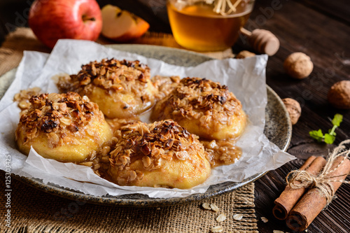 Baked apple with oatmeal, walnuts, honey and cinnamon