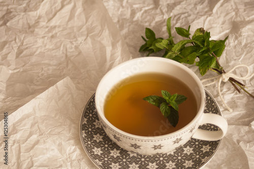 Cup of tea with mint leaves