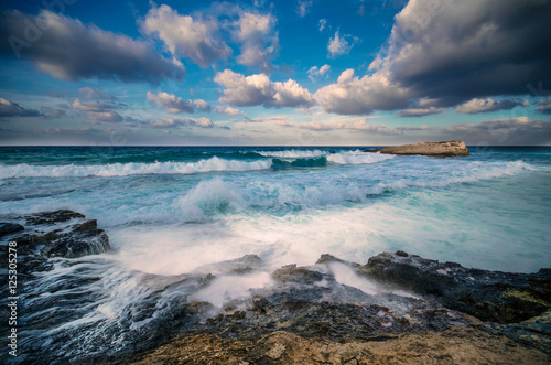 Sea waves crashing against the rocks, Crete, Greece
