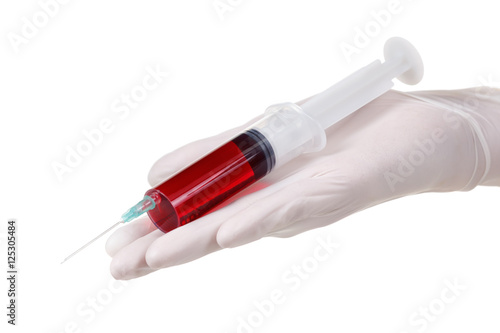 Doctor hand with medical syringe, ready for injection isolated on white