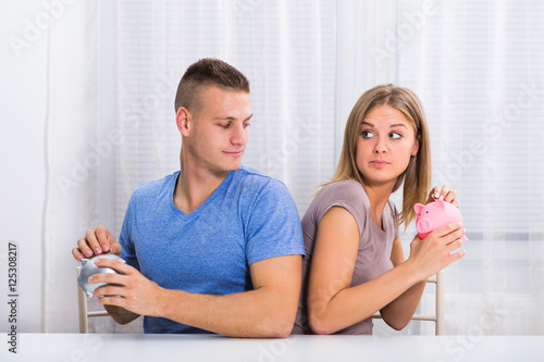 Photos Young couple is hiding savings from each other.