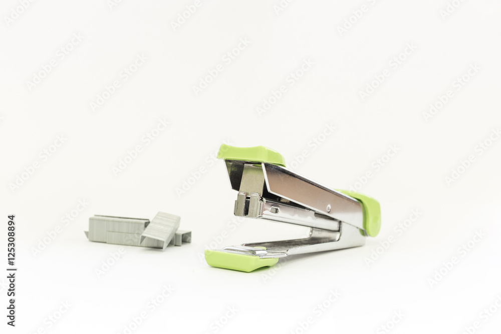 Stapler with staples wires on white background. Stapler with staples wires on white background.