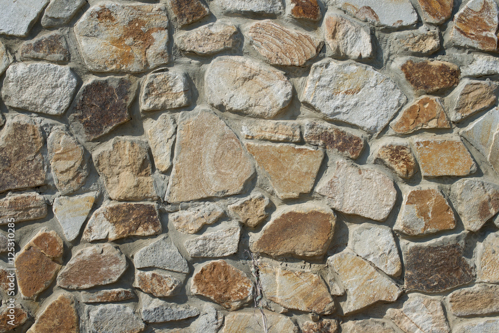 Natural rough stone wall - texture Natural rough stone wall - texture