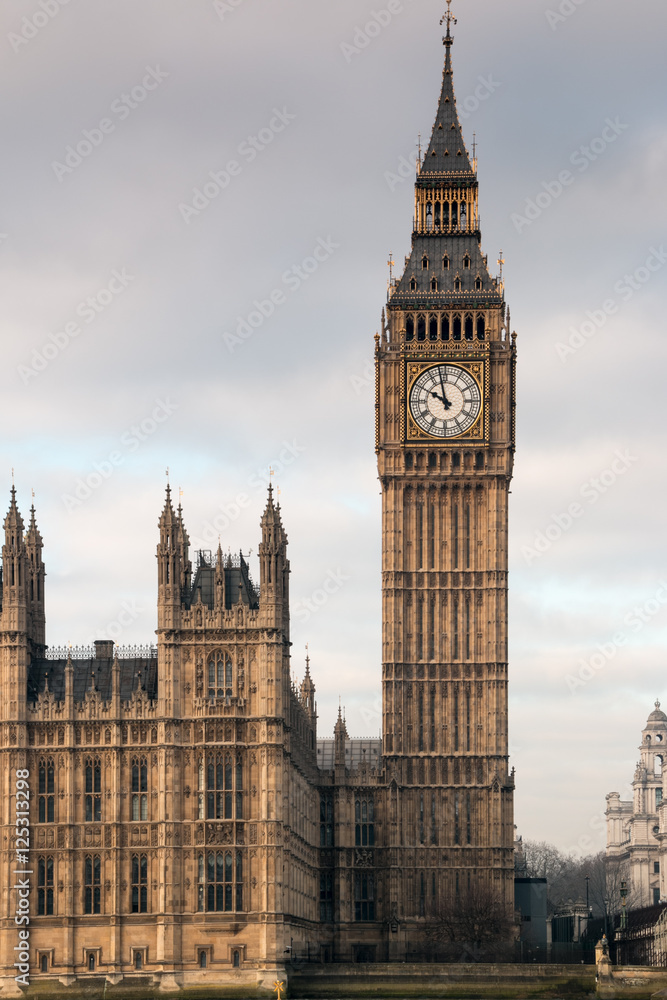 Big Ben portrait style set to right with part Houses of Parliament