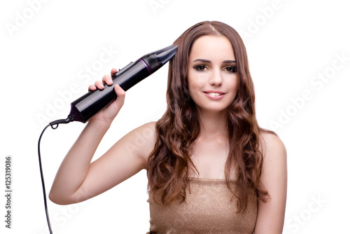 Beautiful woman getting her hair done with hair dryer isolated o