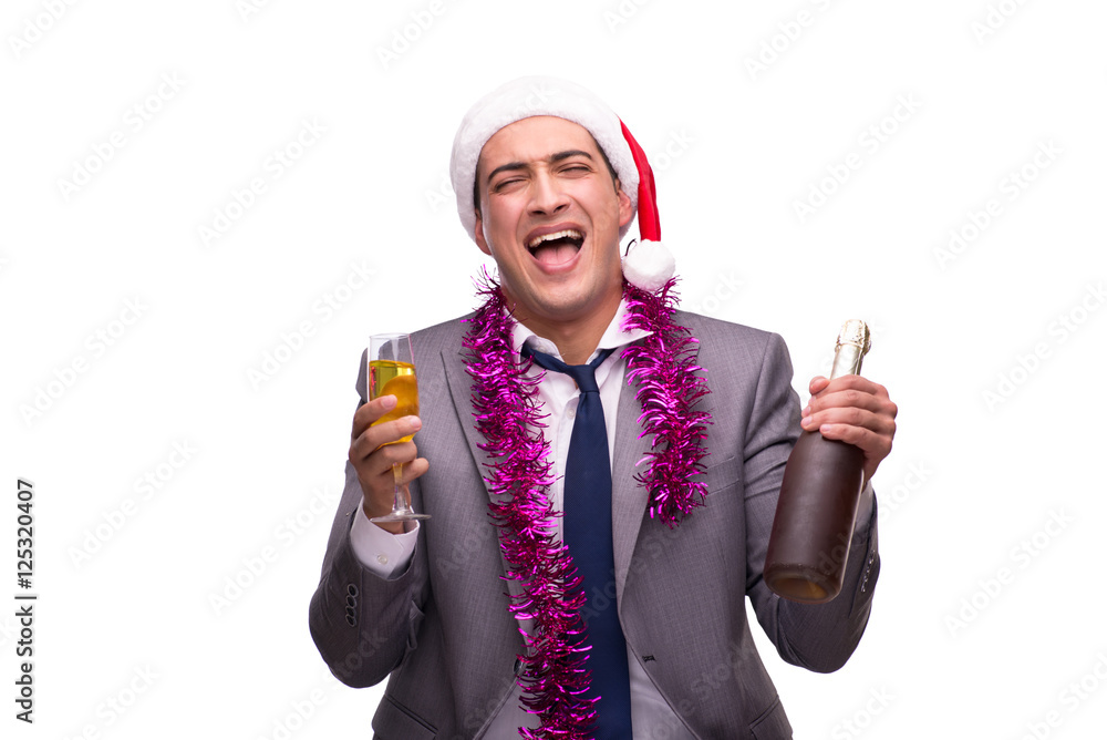 Young businessman celebrating christmas in office Young businessman celebrating christmas in office