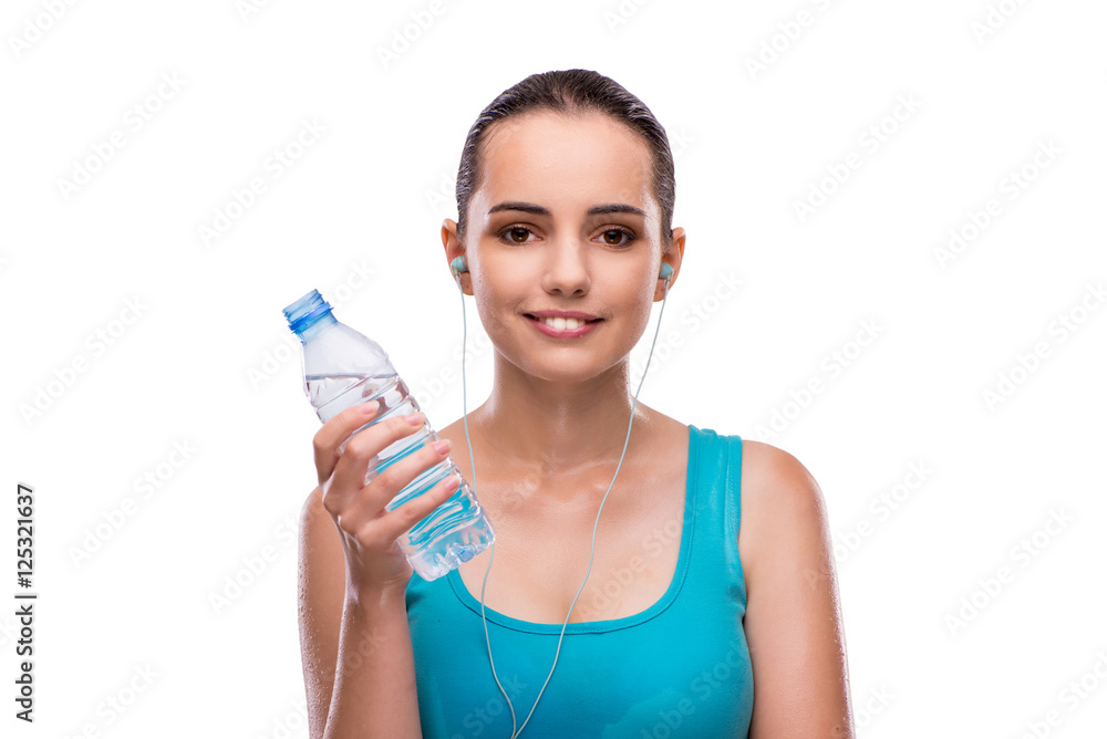 Woman doing sports with bottle of fresh water Woman doing sports with bottle of fresh water