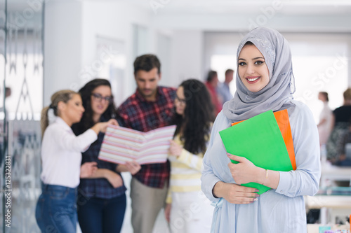 Arabic business woman working in team photo