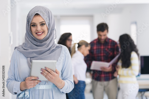 Arabic business woman working in team photo