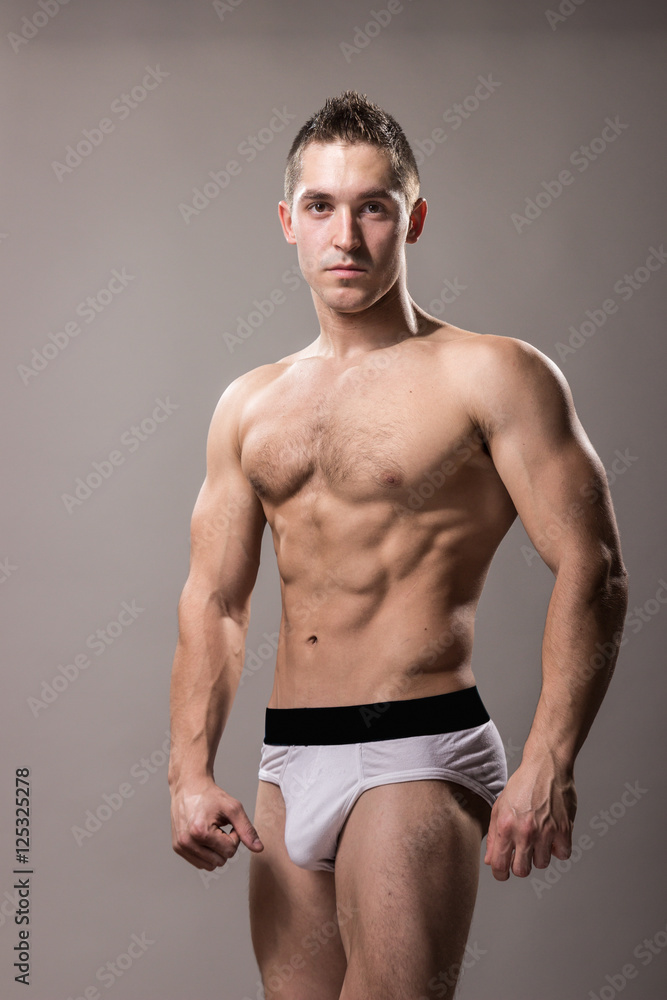 young bodybuilder posing young bodybuilder posing