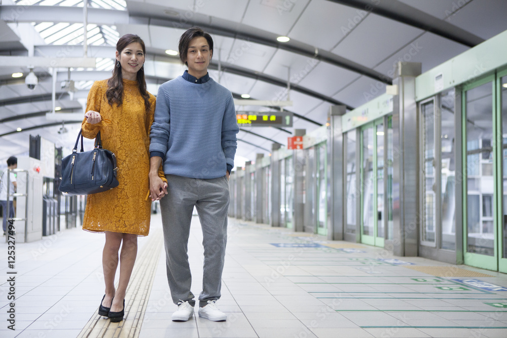 Young couple who is on the platform