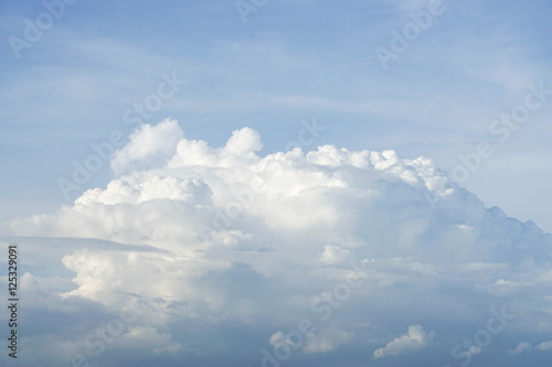 Fototapeta Naklejka Na Ścianę i Meble -  big fluffy cloud in blue sky