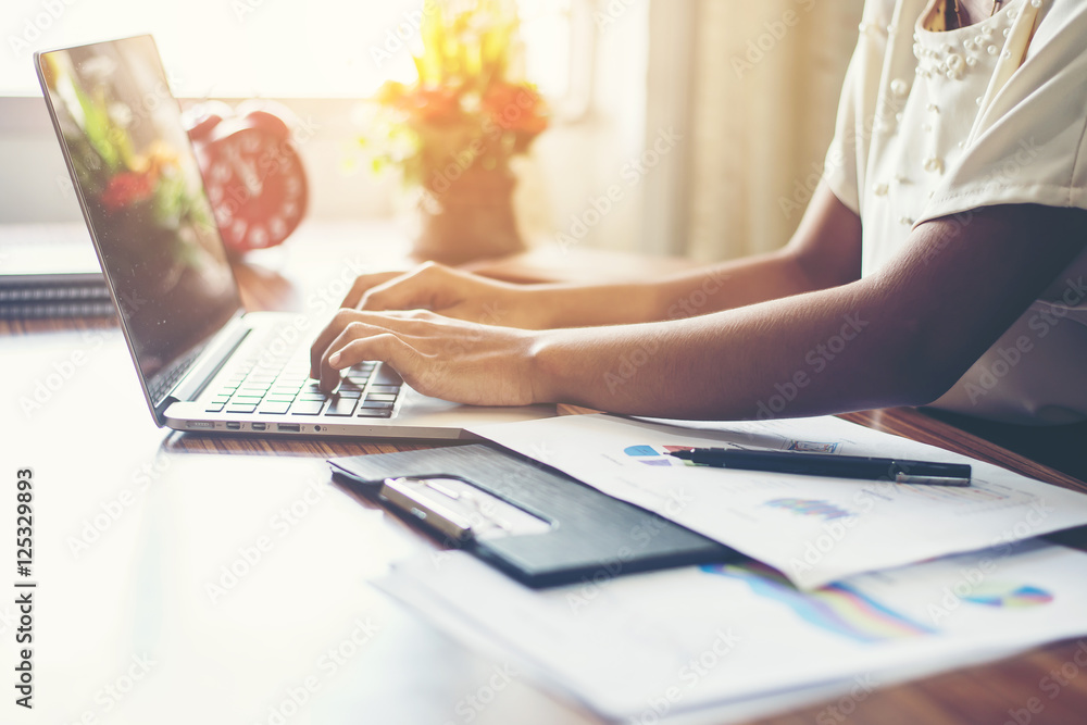Young business woman hands typing on keyboard to work at office. Young business woman hands typing on keyboard to work at office.