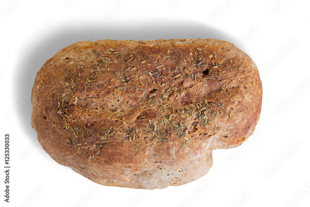 One whole loaf of rye bread isolated on white background. Fresh bread. View from above. Loaf of bread round shape with herbs. One whole loaf of rye bread isolated on white background. Fresh bread. View from above. Loaf of bread round shape with herbs.