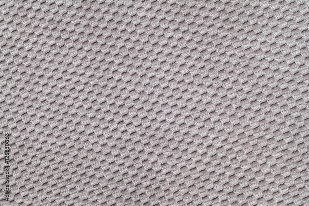 Gray background from soft fleecy fabric closeup. Texture of textile macro Gray background from soft fleecy fabric closeup. Texture of textile macro