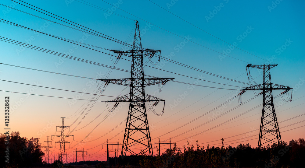 Power lines on a colorful sunrise ,Electric power lines against sky at sunrise