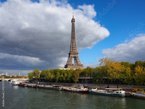 Eiffel tower and quay Seine river. Paris  France