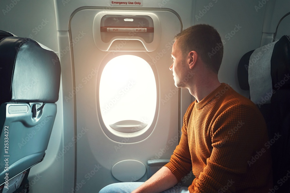 Obraz premium Traveling by airplane