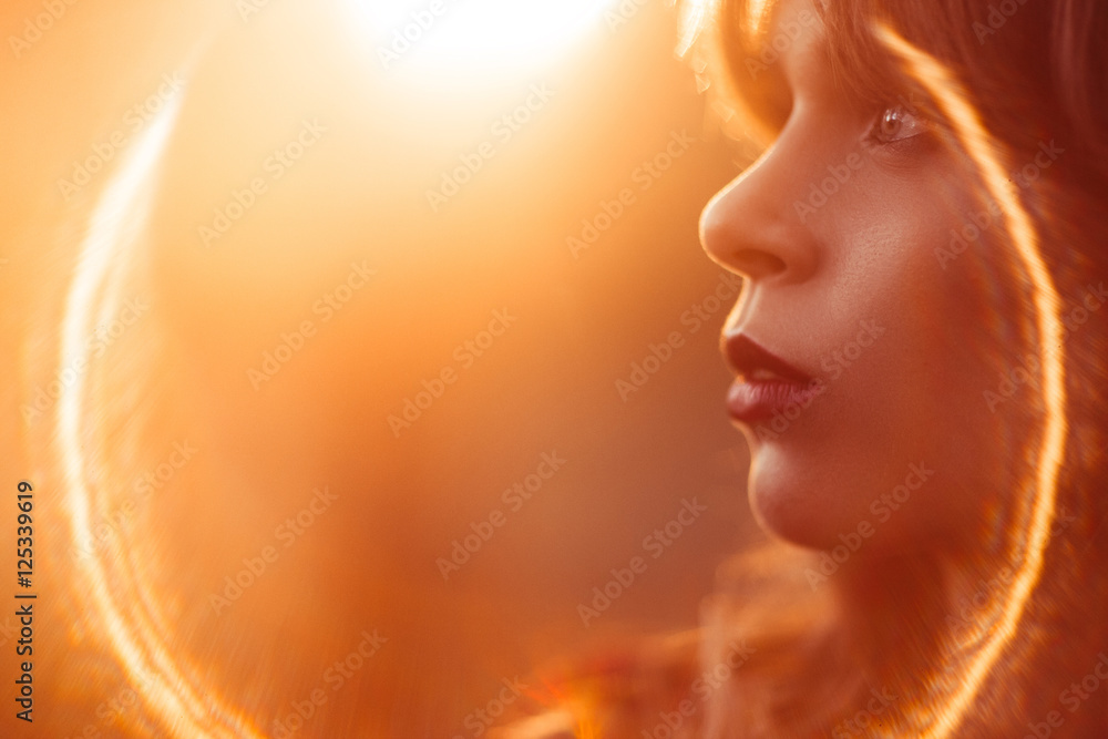 Beautiful woman profile, lens flare effect, free space for text. Fashion background, art photography, beauty concept Beautiful woman profile, lens flare effect, free space for text. Fashion background, art photography, beauty concept