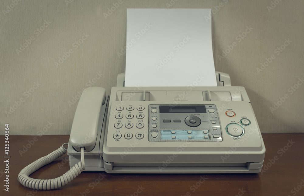 old fax machine on the table - obrazy, fototapety, plakaty 