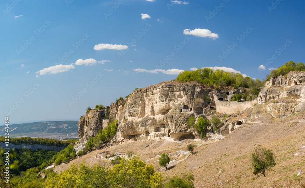 Hollowed out of the rock at the South gate of the medieval town-fortress Chufut-Kale. Bakhchysaray, Crimea