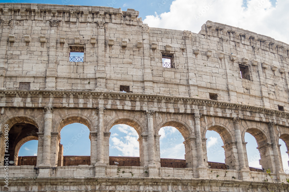 Obraz premium The Colosseum or Coliseum, also known as the Flavian Amphitheatre in Rome, Italy