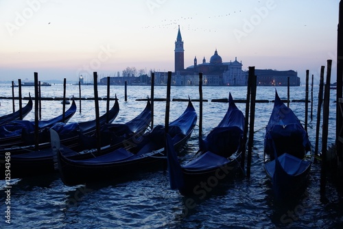 Gondolas at morning light with view over