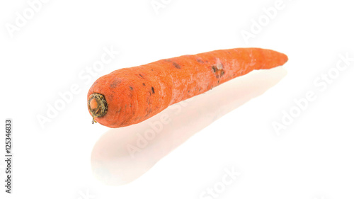 Foto Rotten carrot isolated on white background