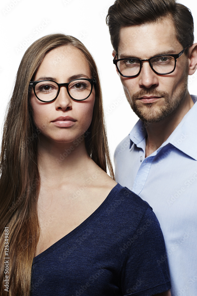 Serious couple wearing spectacles, portrait Serious couple wearing spectacles, portrait