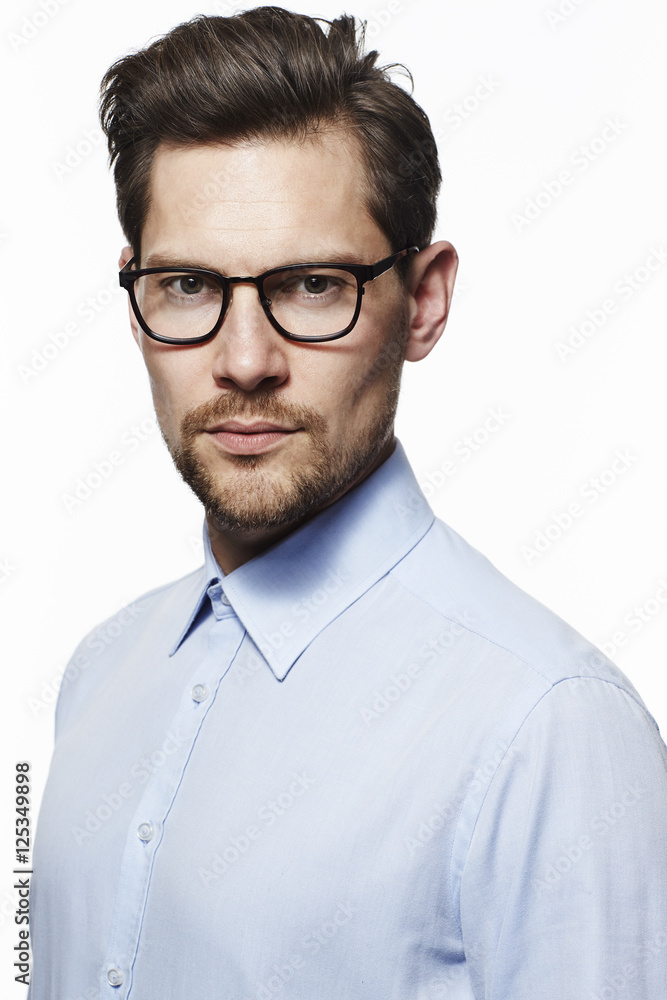 Serious man in glasses an shirt, portrait Serious man in glasses an shirt, portrait