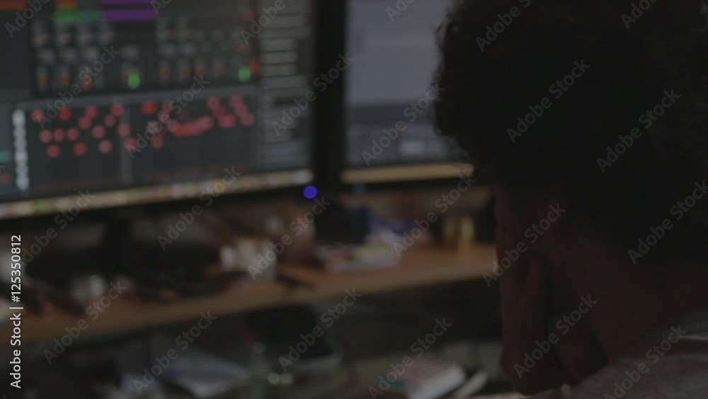 A man making music on a computer sofware A man making music on a computer sofware