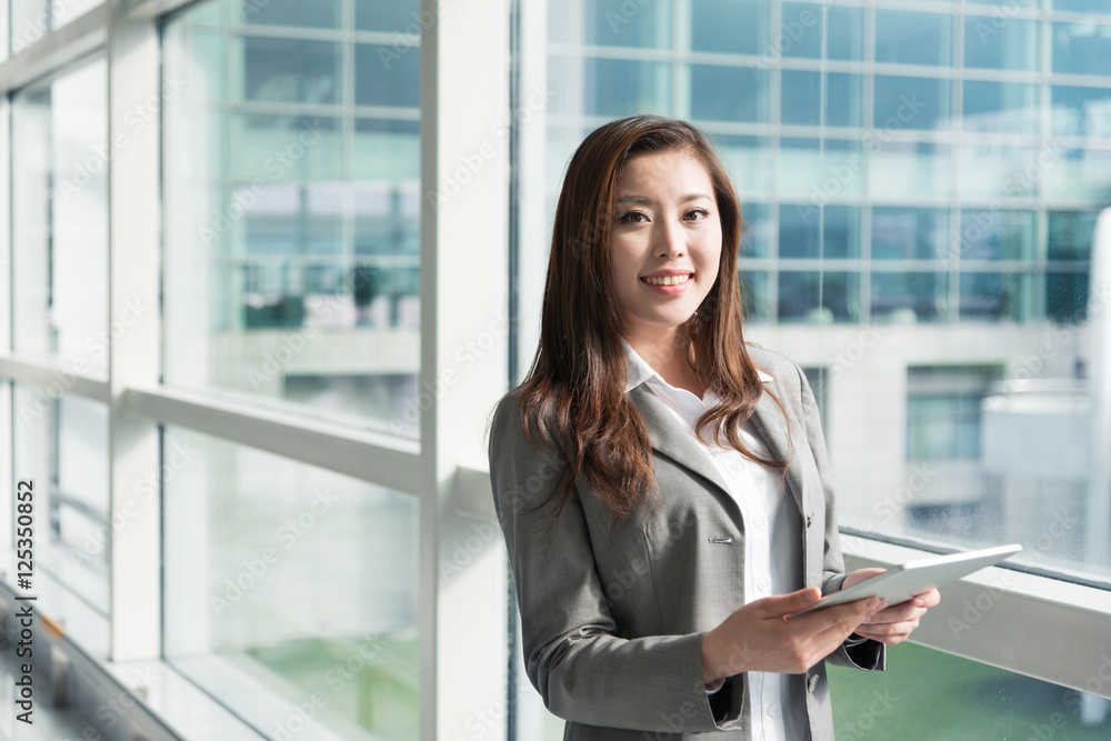 beautiful asian young girl with tablet beautiful asian young girl with tablet