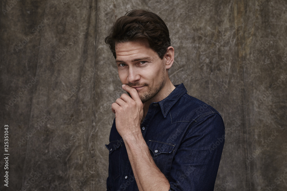 Posing man in denim shirt, portrait Posing man in denim shirt, portrait
