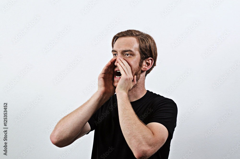 Shouting Young Adult Male in Dark T-Shirt Shouting Young Adult Male in Dark T-Shirt